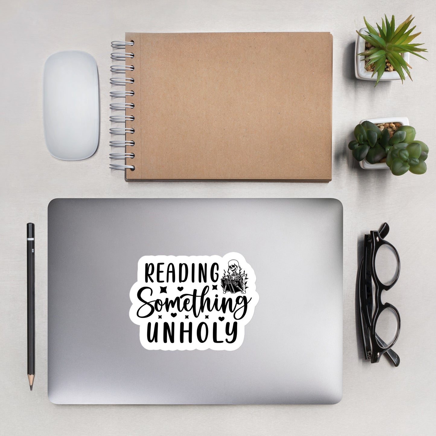 Reading something Unholy Skeleton Sticker