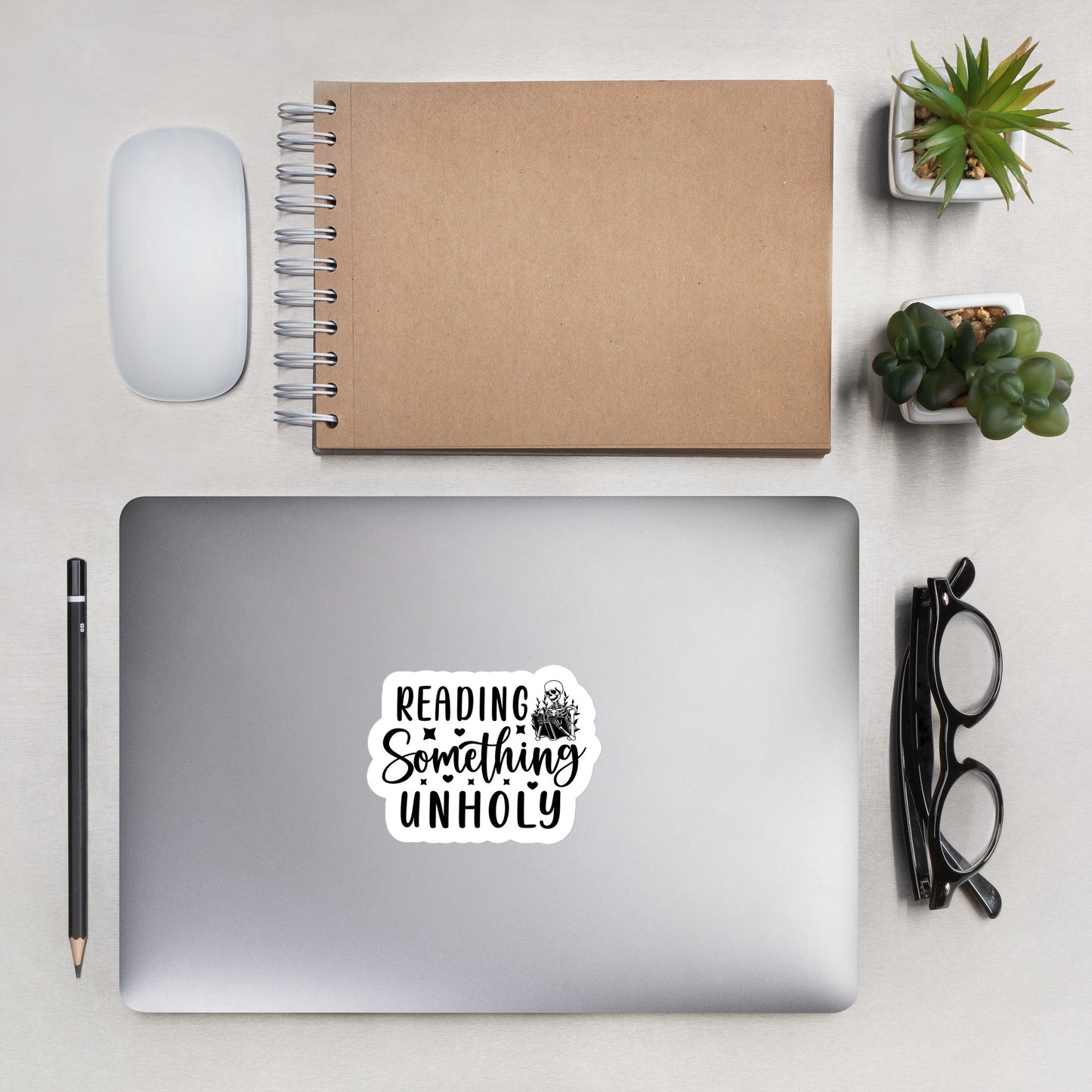 Reading something Unholy Skeleton Sticker