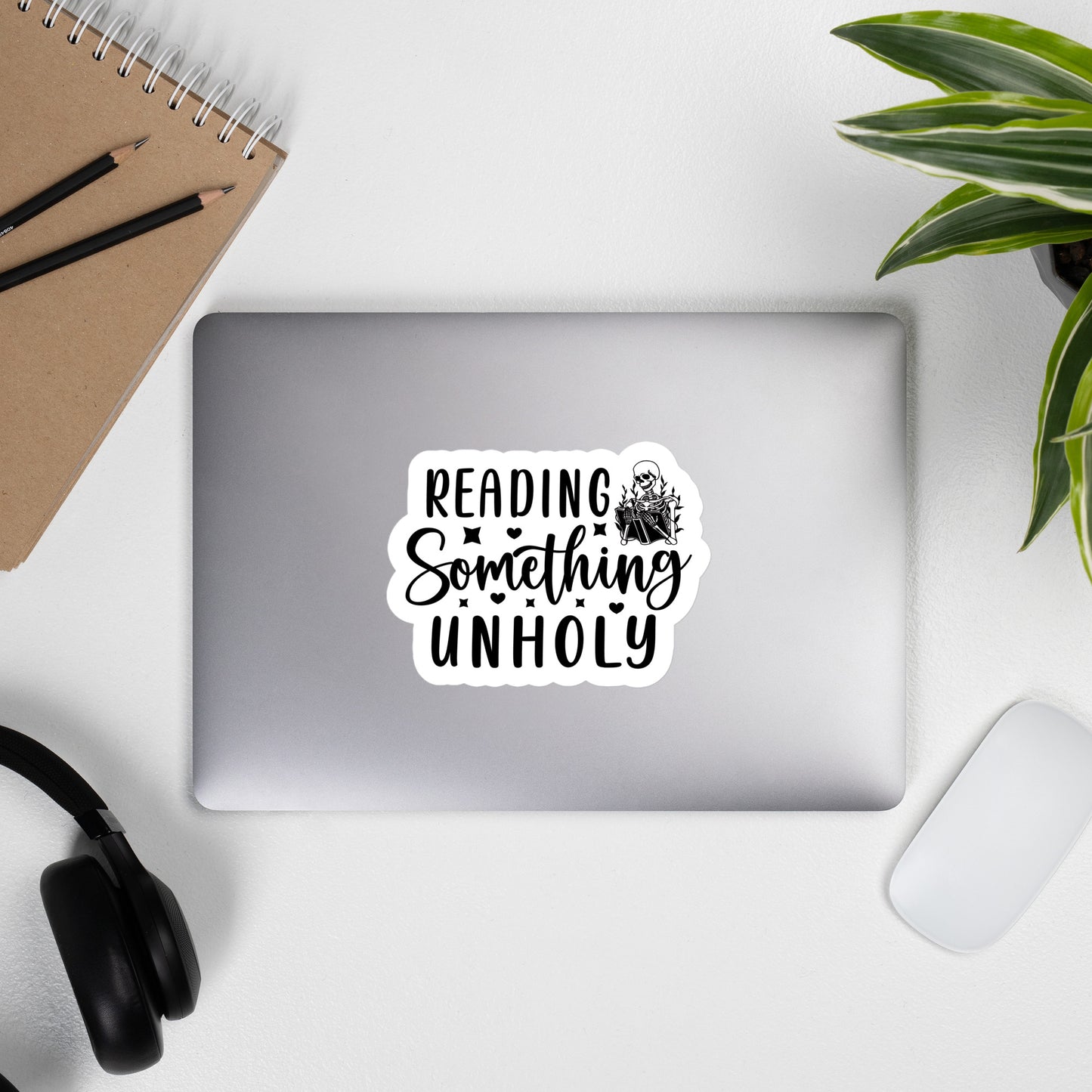 Reading something Unholy Skeleton Sticker